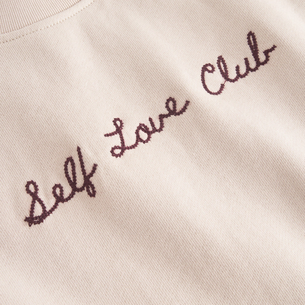 Sweatshirt Ystad Self Love Club EMB Oat White | DEDICATED